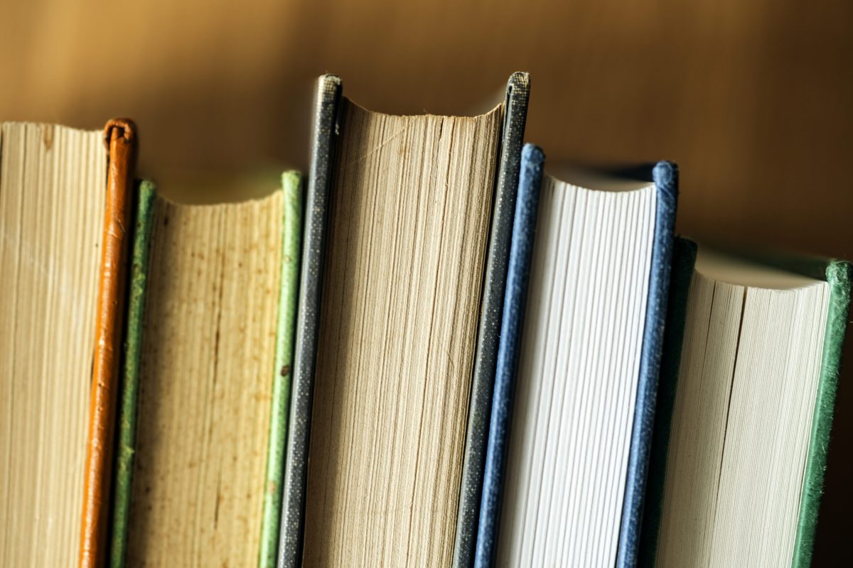 Closeup of stack of antique books educational, academic and literary concept